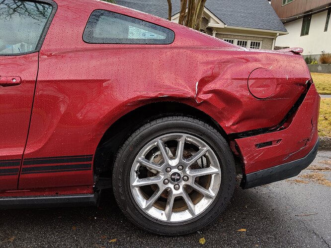 2011-ford-mustang-damage-side-view